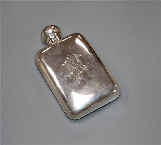 An Edwardian silver hip flask by George & George Neal, London, 1905, 12.7cm.